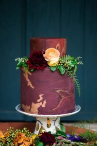 magenta gold leaf detail floral wedding cake