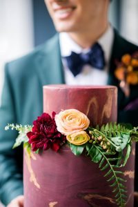 magenta gold leaf detail floral wedding cake