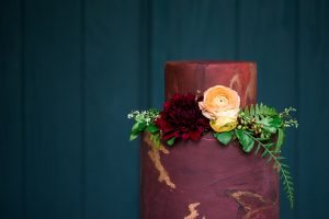 magenta gold leaf detail floral wedding cake