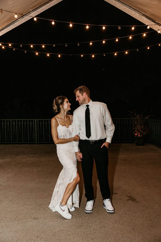 couple under lights at Boulder Ridge Country Club