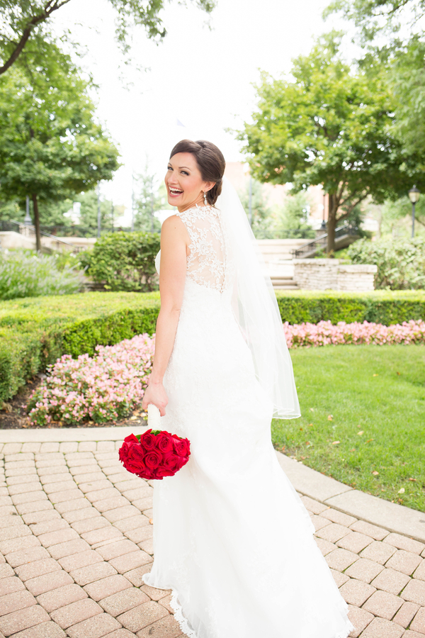 Bride with red rose bouquet